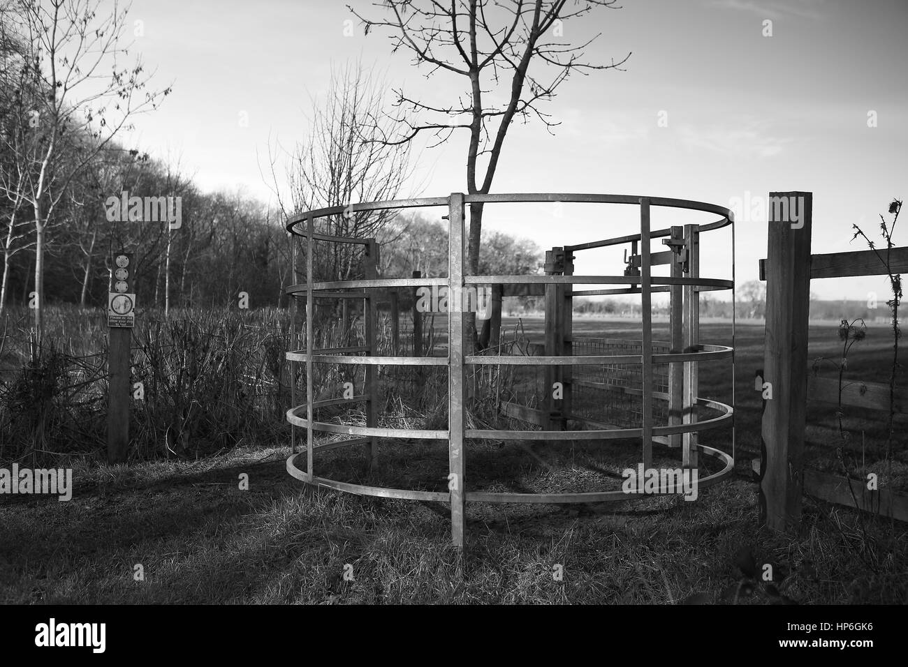 Modern Kissing gate in Lincolnshire near woodland and nature trail Stock Photo