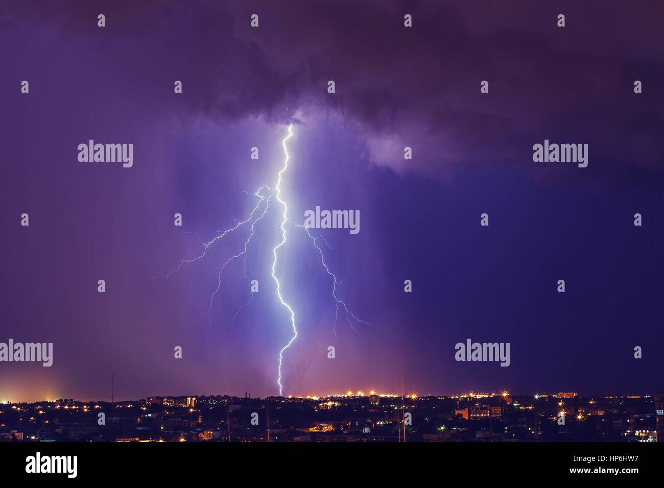 Beautiful lightning above the night city Stock Photo - Alamy
