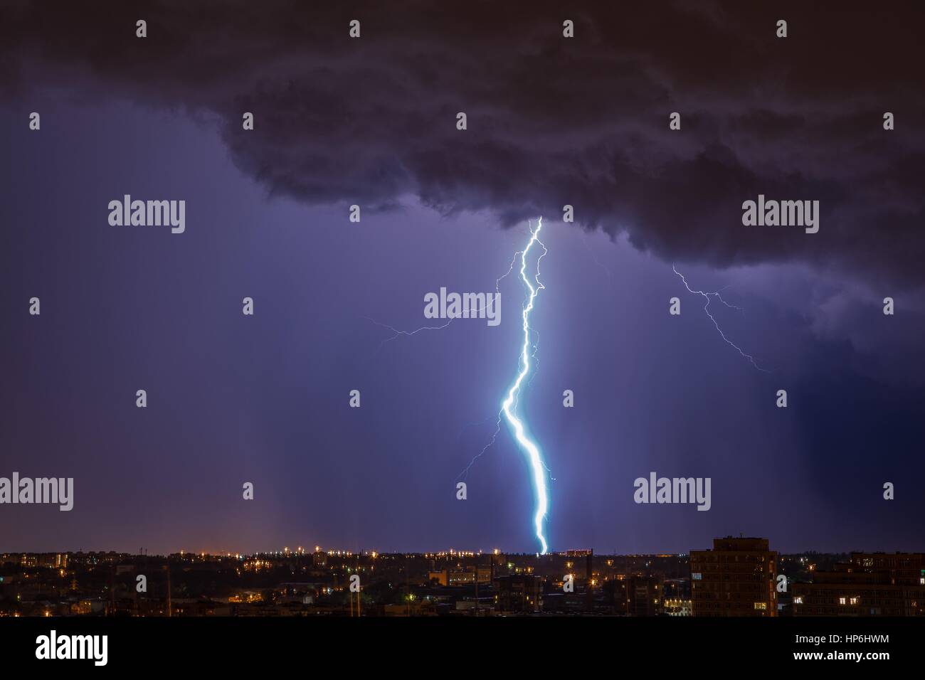 Beautiful lightning above the night city Stock Photo - Alamy