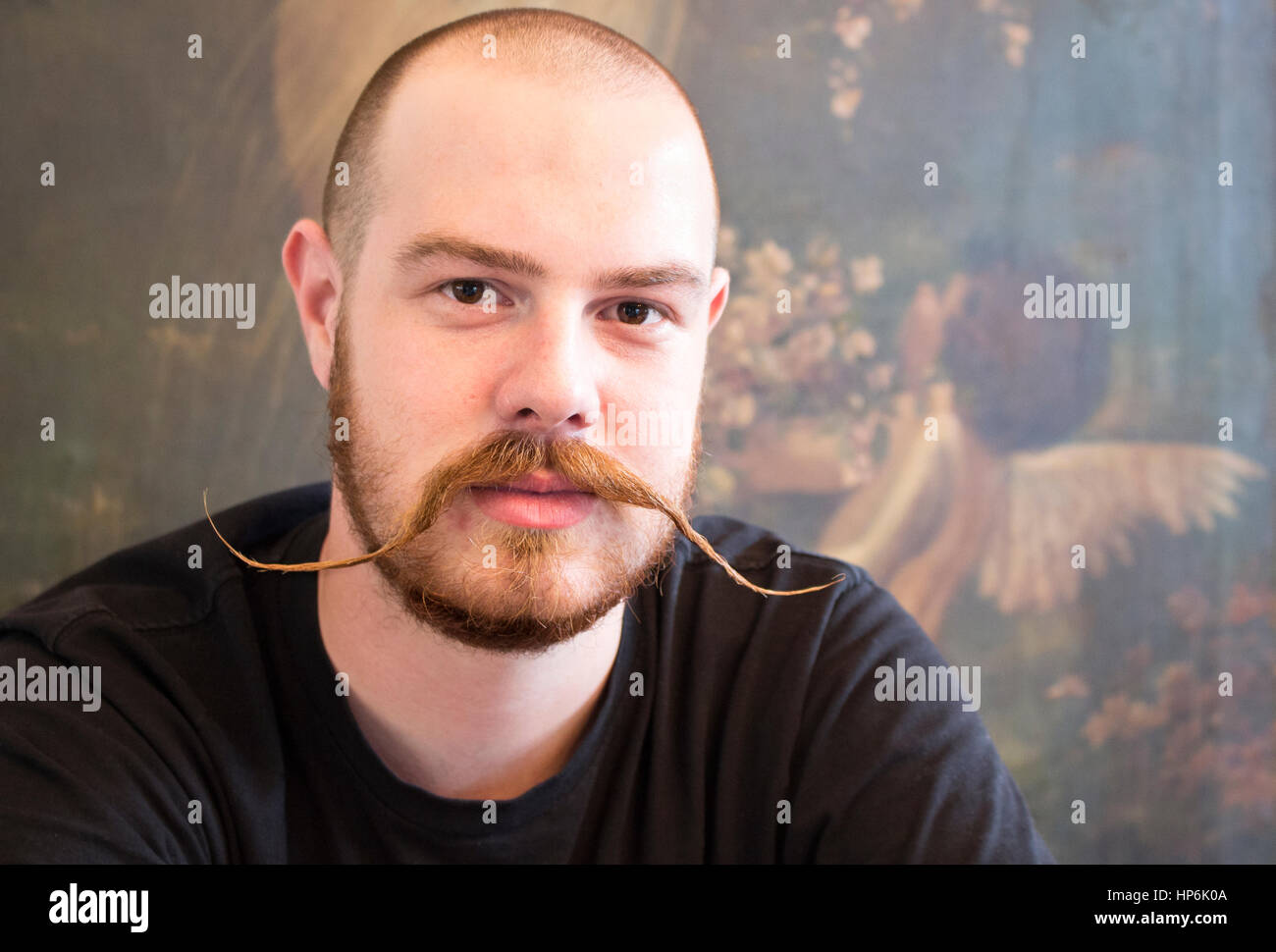 Portrait of a young man with handlebar moustache in Napier, New Zealand. Stock Photo