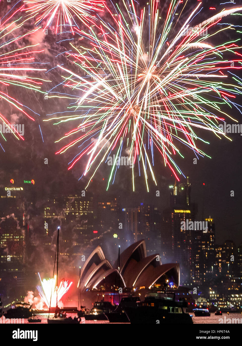 Fireworks over Sydney Harbor with the Sydney Opera House lit up on New