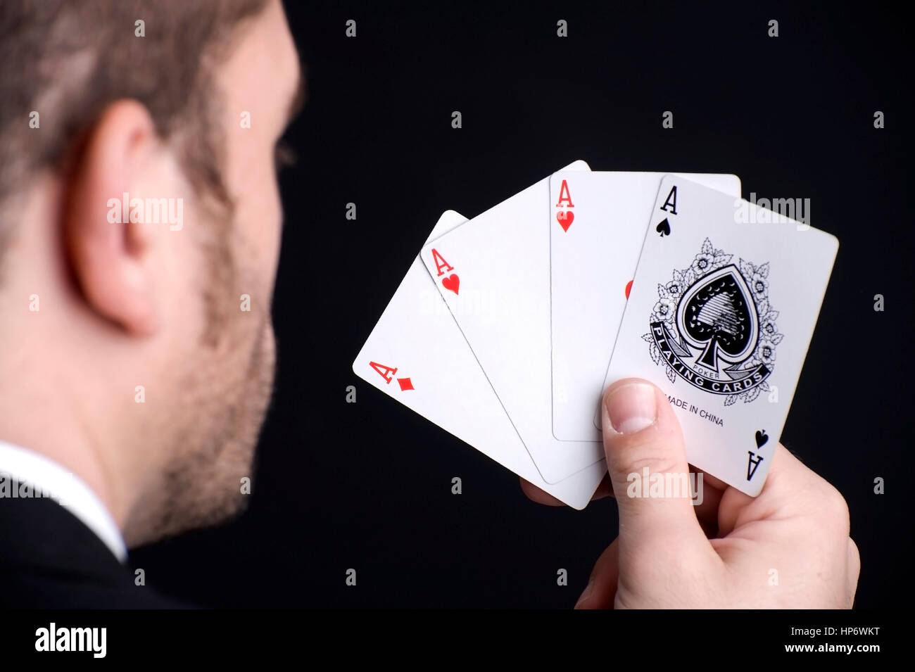 Model released , Kartenspieler mit gezinkten Karten - card player with Stock Photo