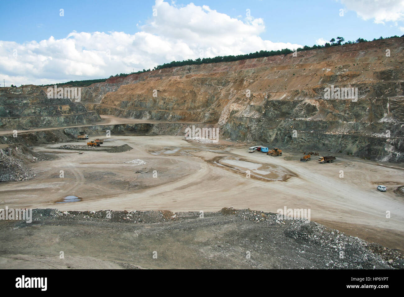 Bottom of surface mining and machinery in an open pit mine Stock Photo