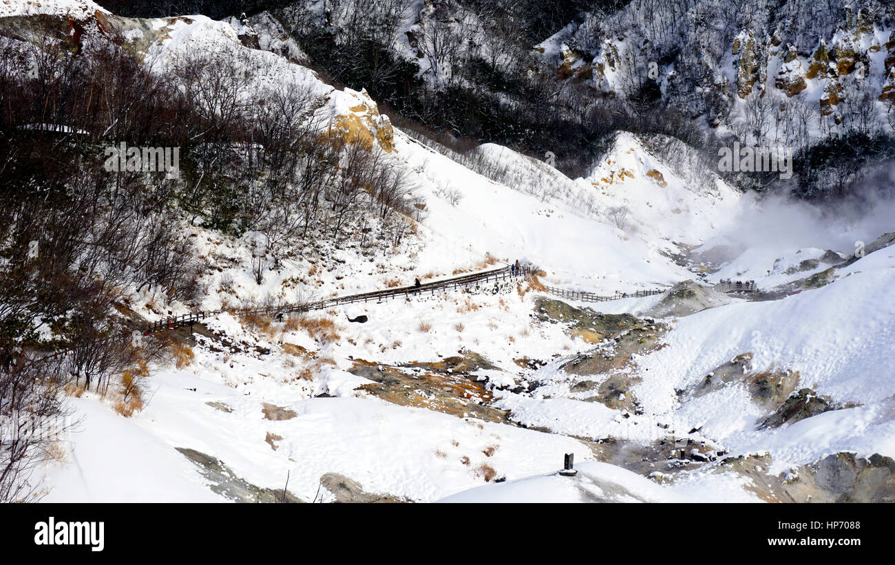 Noboribetsu onsen and bridge hell valley snow winter national park in Jigokudani, Hokkaido, Japan Stock Photo