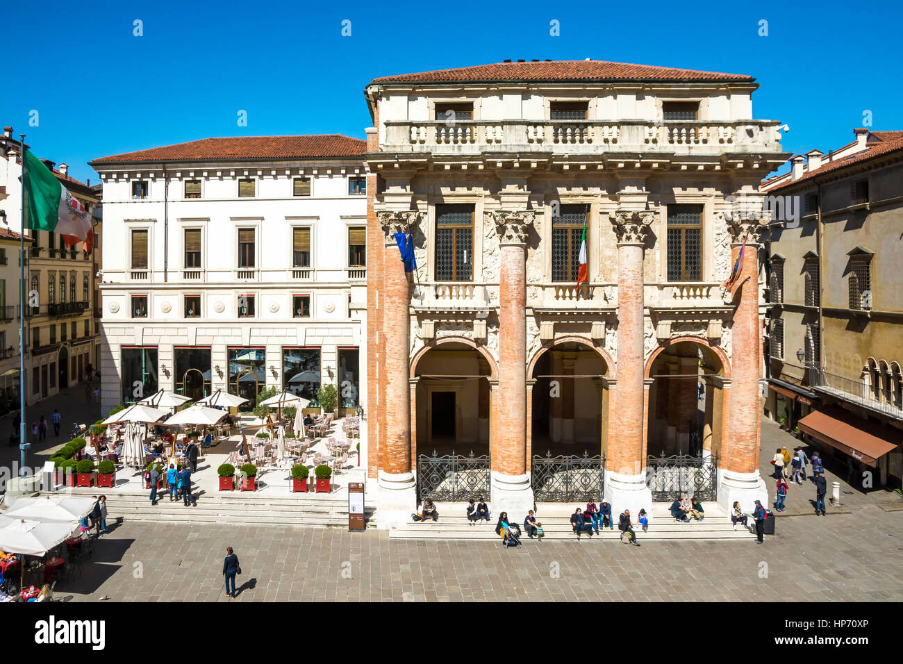 Vicenza,Italy-April 3,2015:people stroll in front of the Capitaniato  lodge in the Vicenza town square .during a sunny day. Stock Photo