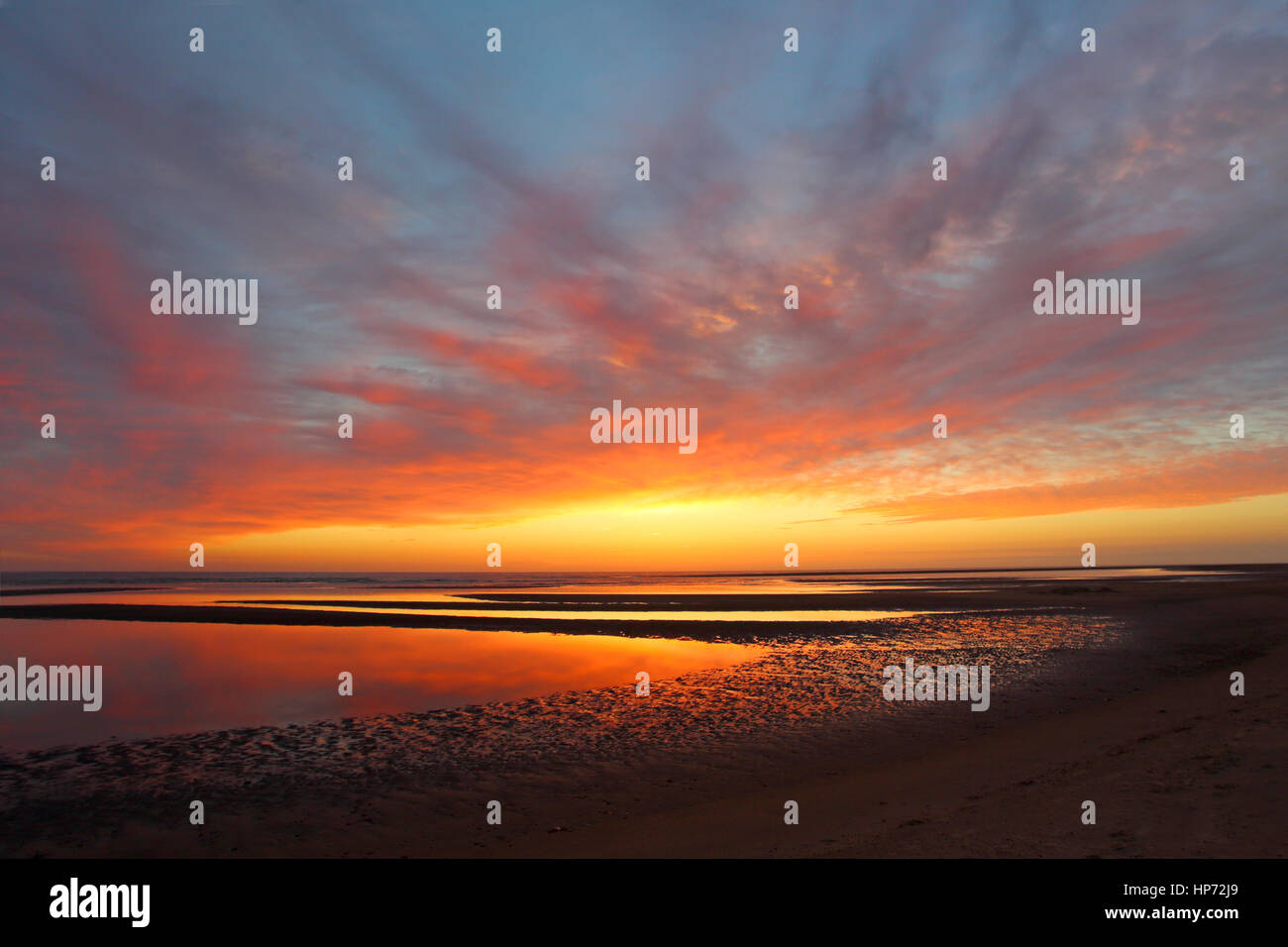 Sunrise along the north Norfolk coast at the beach by Burnham Overy Dunes in June Stock Photo