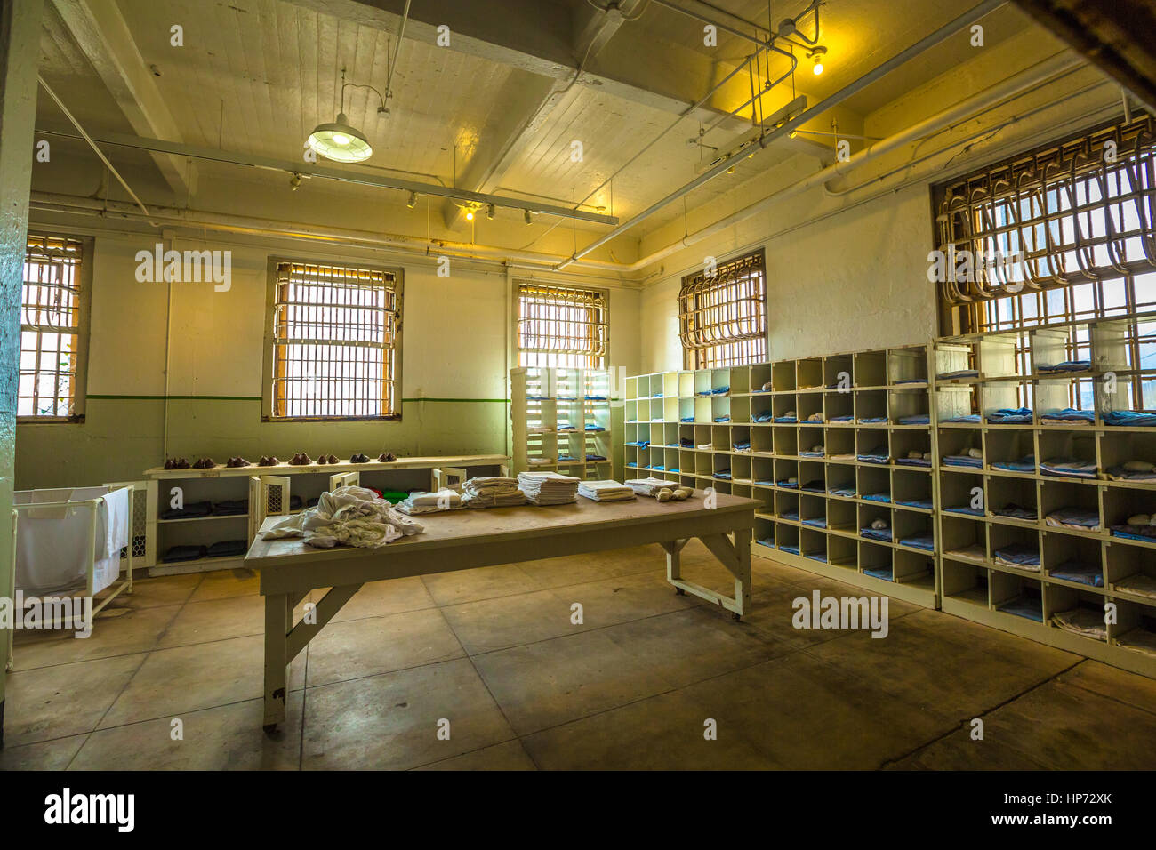 San Francisco, California, United States - August 14, 2016: Alcatraz laundry room with uniforms, linens and blankets. The Alcatraz prison are a popula Stock Photo