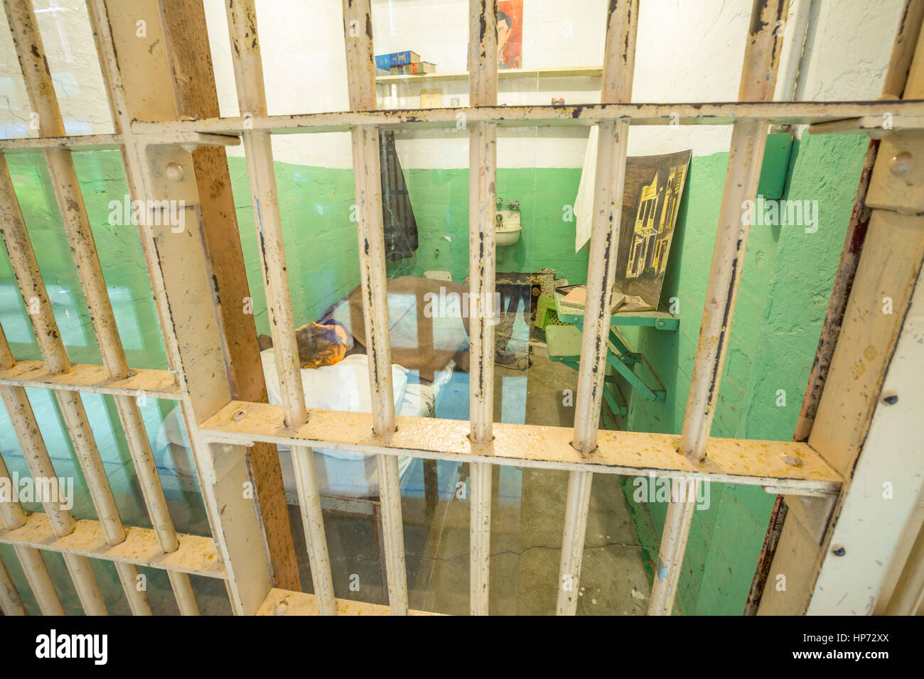 San Francisco, California, United States - August 14, 2016: Alcatraz famous cell of Clarence Anglin used in movie: Escape from Alcatraz 1989. Hole in  Stock Photo