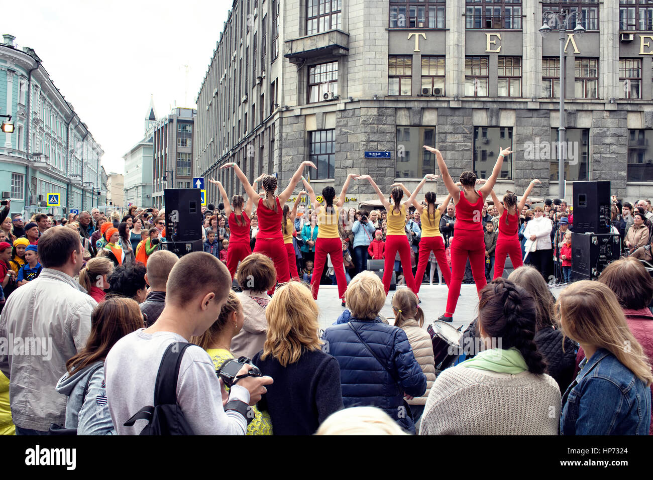 Girl group performs and many people watch them at Moscow City day Celebrations and Festival in Moscow city center on Tverskaya street. Stock Photo