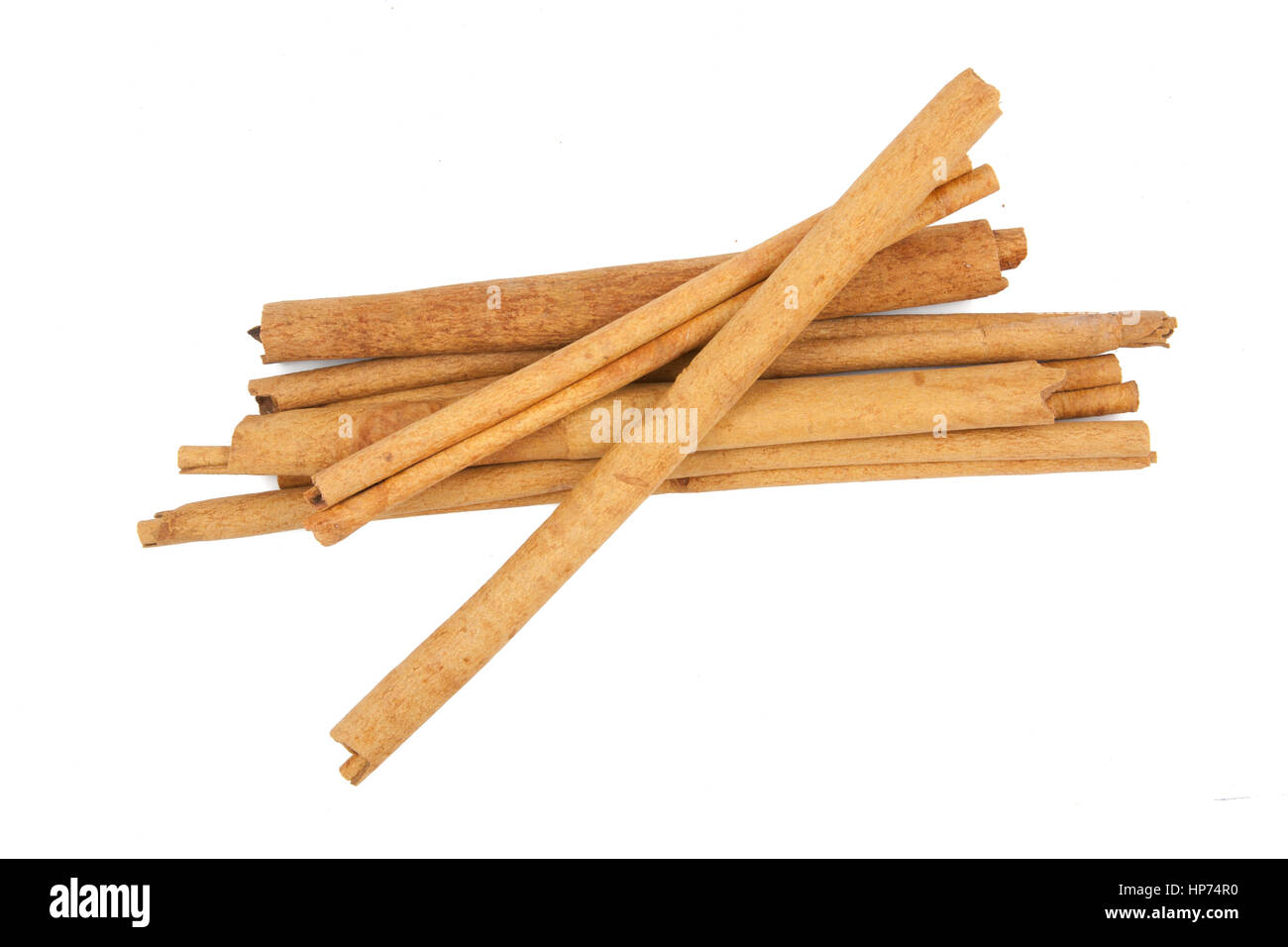 cinnamon ingredients close up isolated on white background Stock Photo