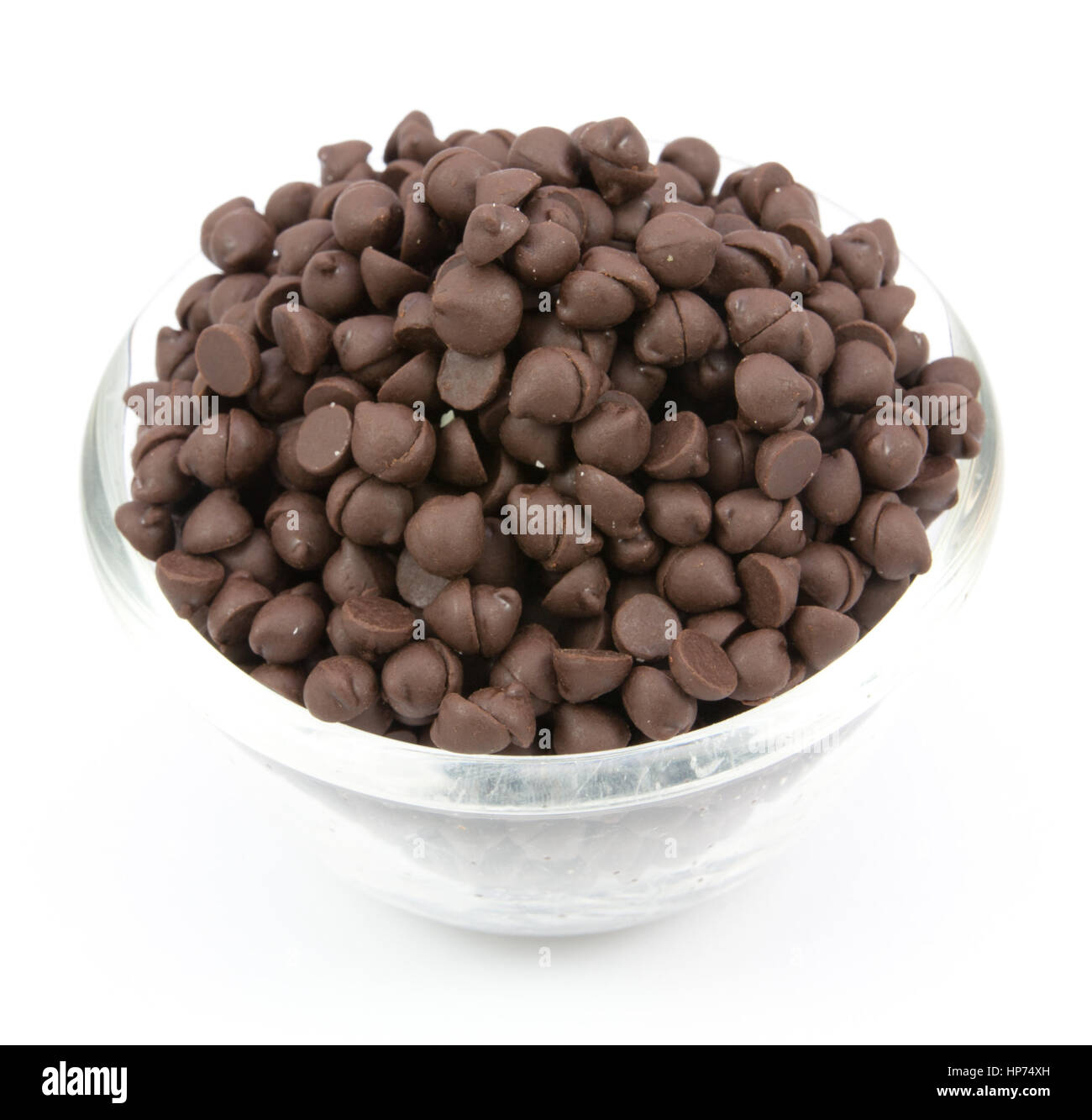 Chocolate Chips  in a bowl  isolated on white background Stock Photo
