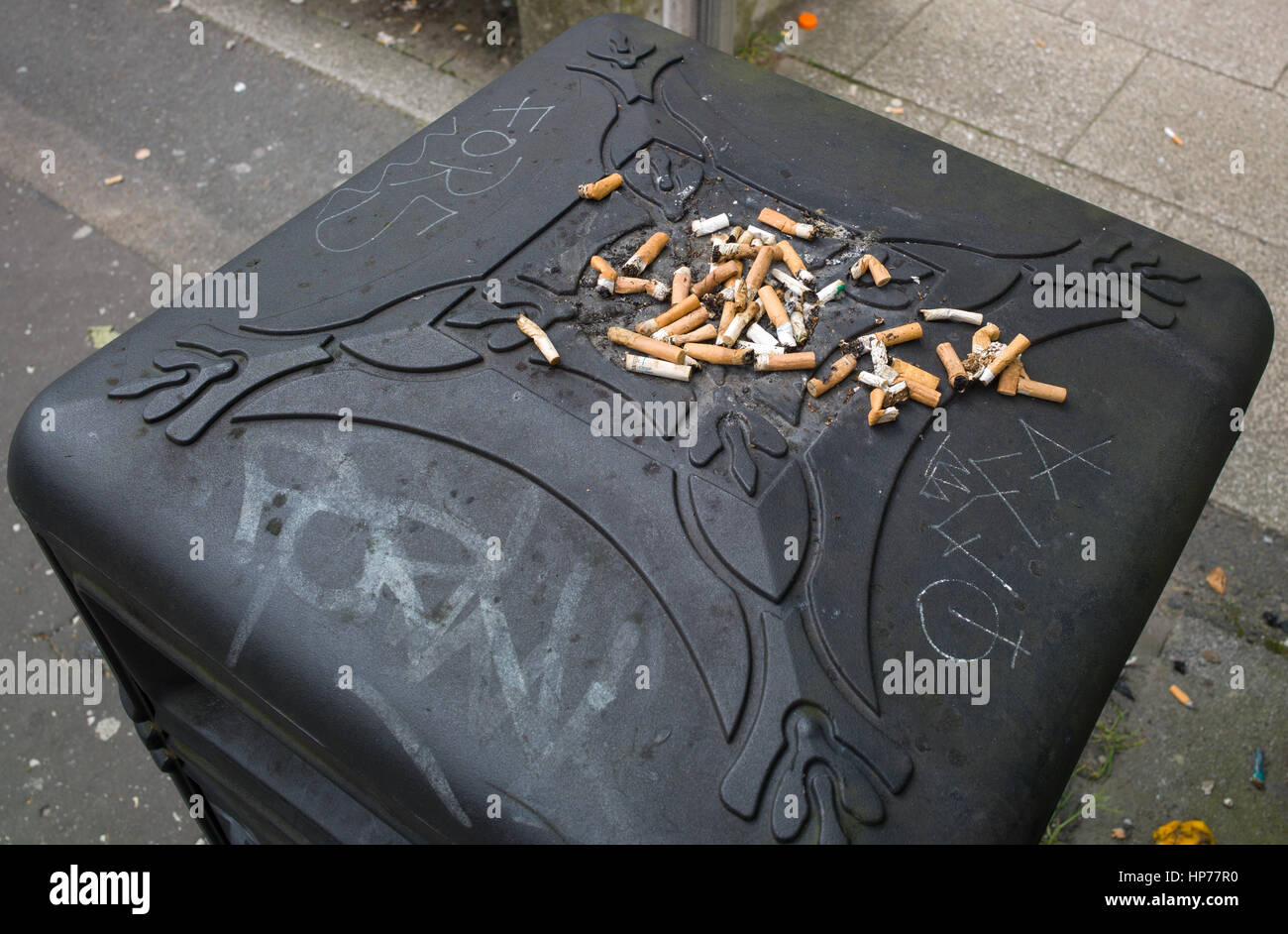 Cigarette ends on top of liter bin, Manchester, UK Stock Photo Alamy
