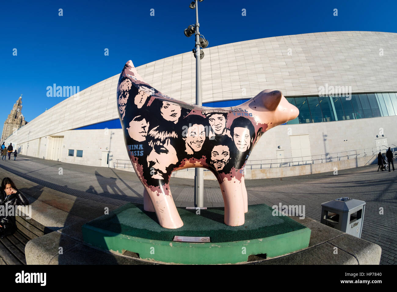 Fibreglass cow outside Museum of Liverpool on Liverpool's historic waterfront, UK (taken with fish eye lens) Stock Photo