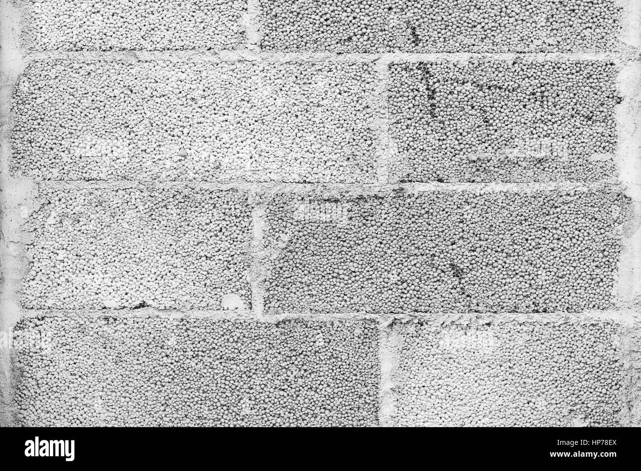 Close-up of a concrete block wall texture in black&white. Stock Photo