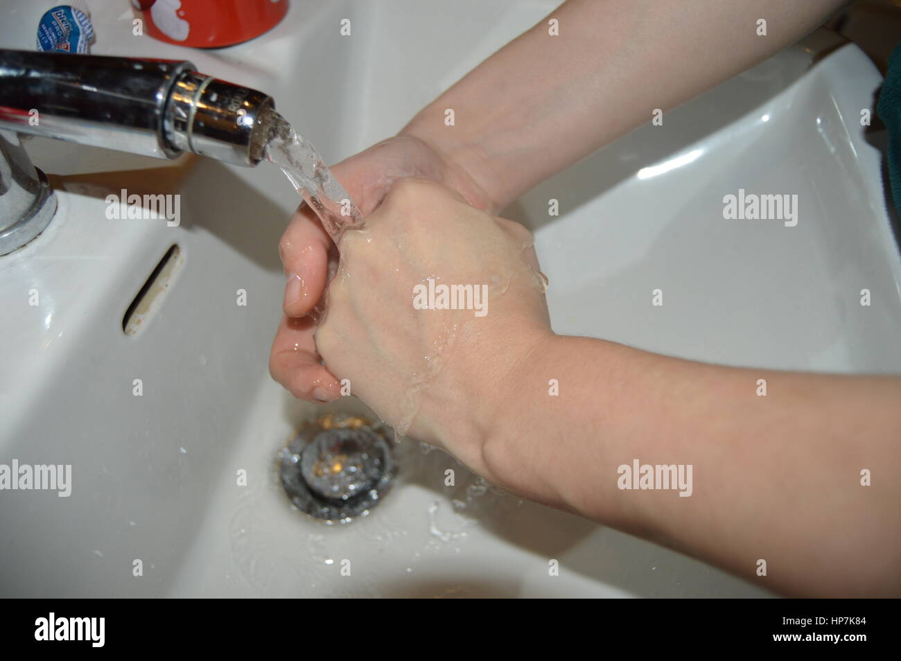 Woman Washing hands Stock Photo