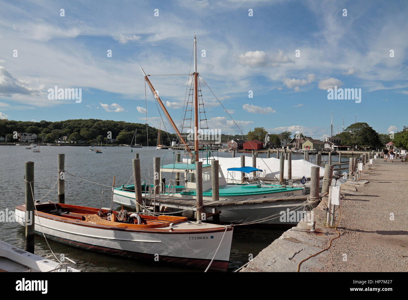 General view of boats moored in the harbor in Mystic Seaport in Mystic, Connecticut, United States. Stock Photo