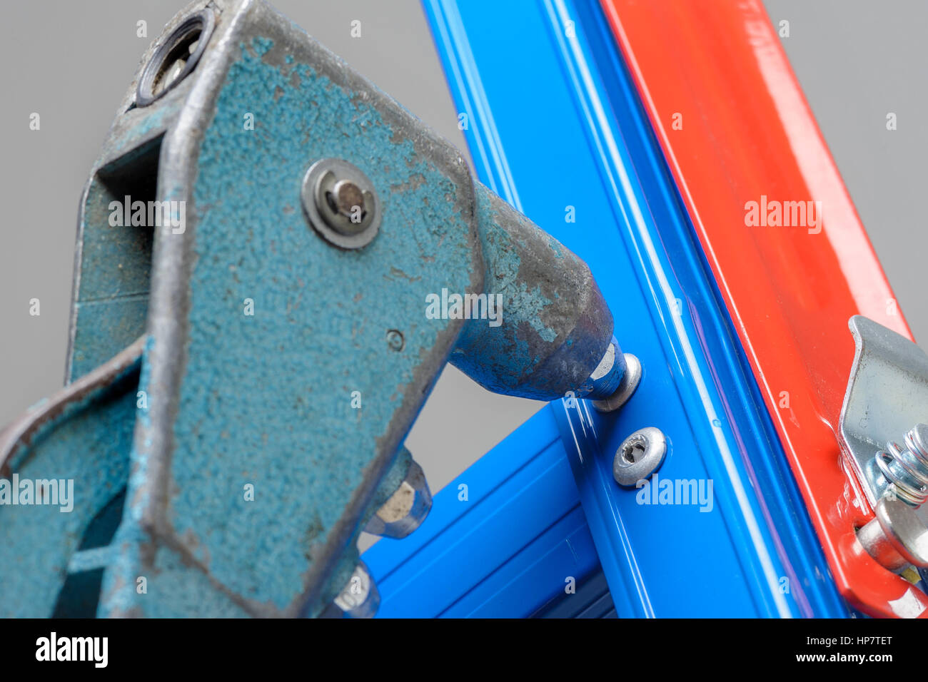 closeup pop rivet gun to fix metal frame Stock Photo