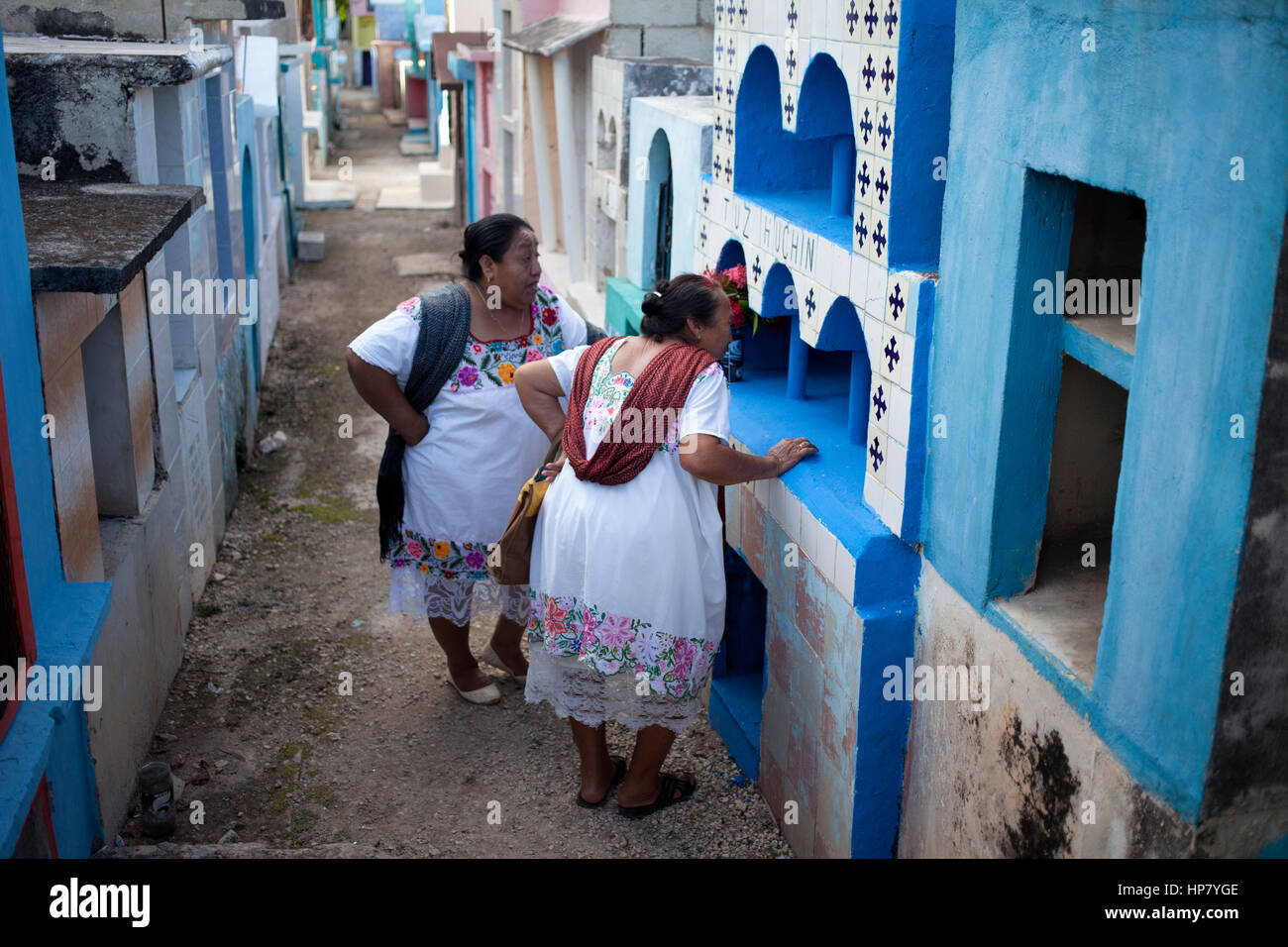 Mayan women visit the tomb of a deceased family member in the village of Pomuch, Hecelchakan, Campeche, Yucat‡n pen’nsula, October 30, 2016, as part o Stock Photo