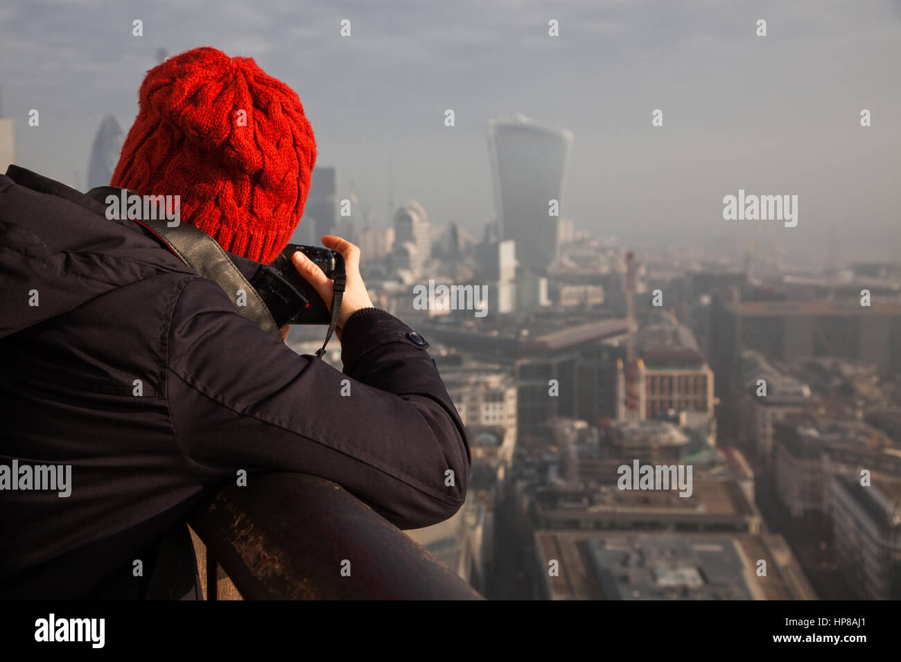 woman tourist on top of St Paul's cathedral, London, UK Stock Photo