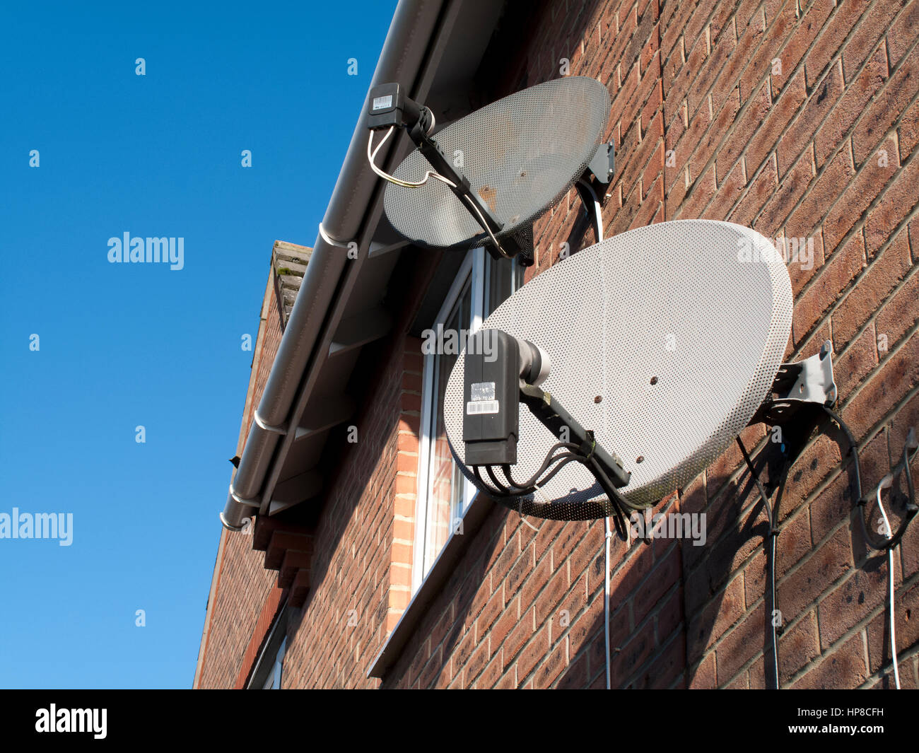 Television satellite receivers fixed to residential buildings Stock