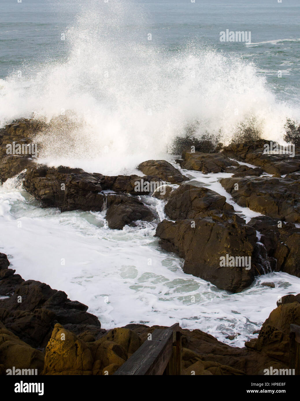Waves crashing on rocks Stock Photo