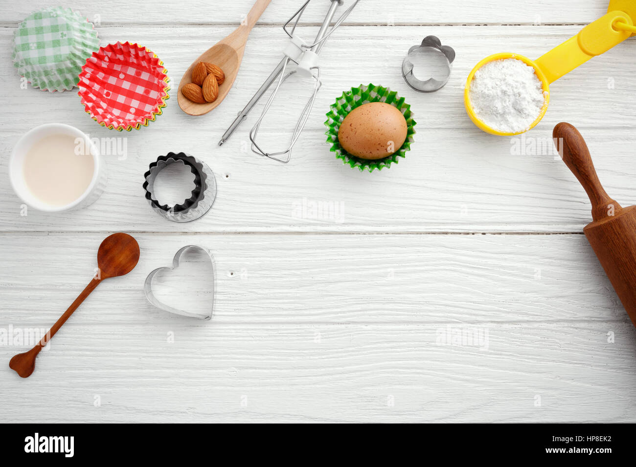 Baking background with baking ingredients and tool on wooden table ...