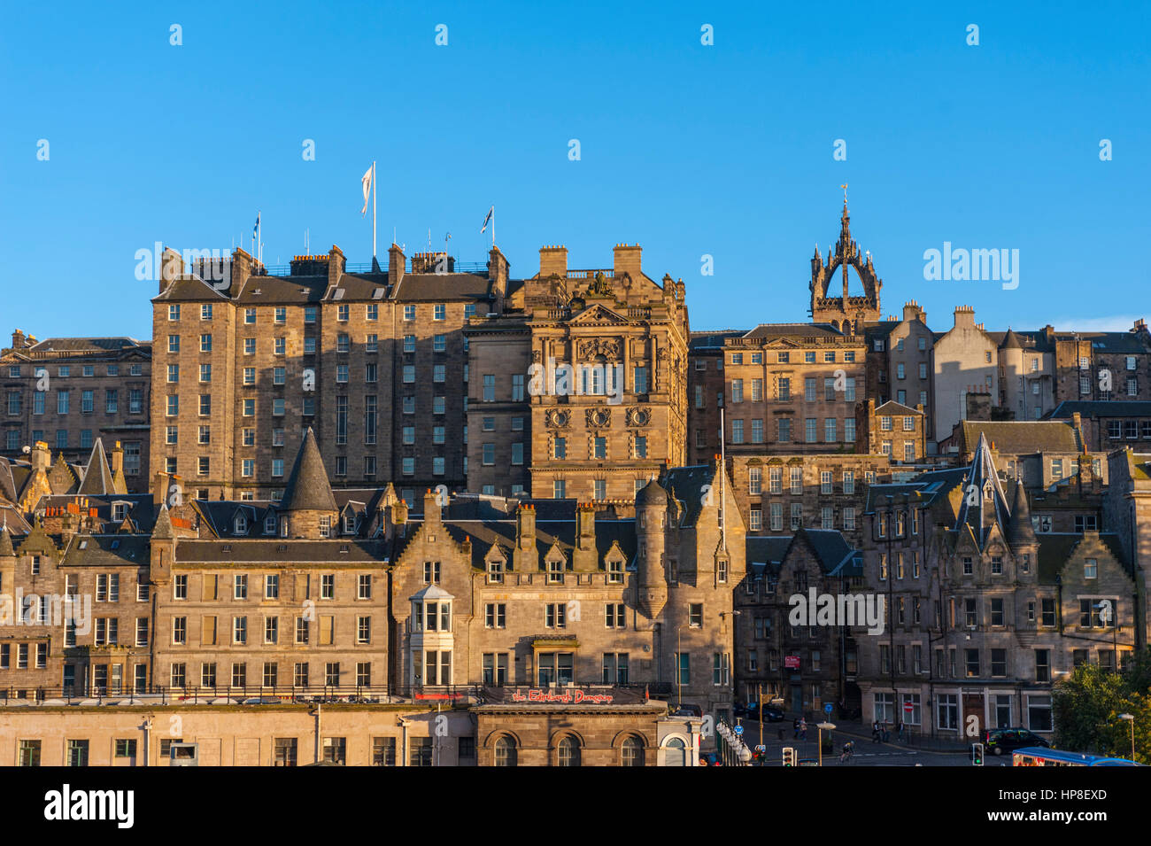 The rear of The city chambers and St Giles Cathedral from Pincess street, Edinburgh, at sunset Stock Photo