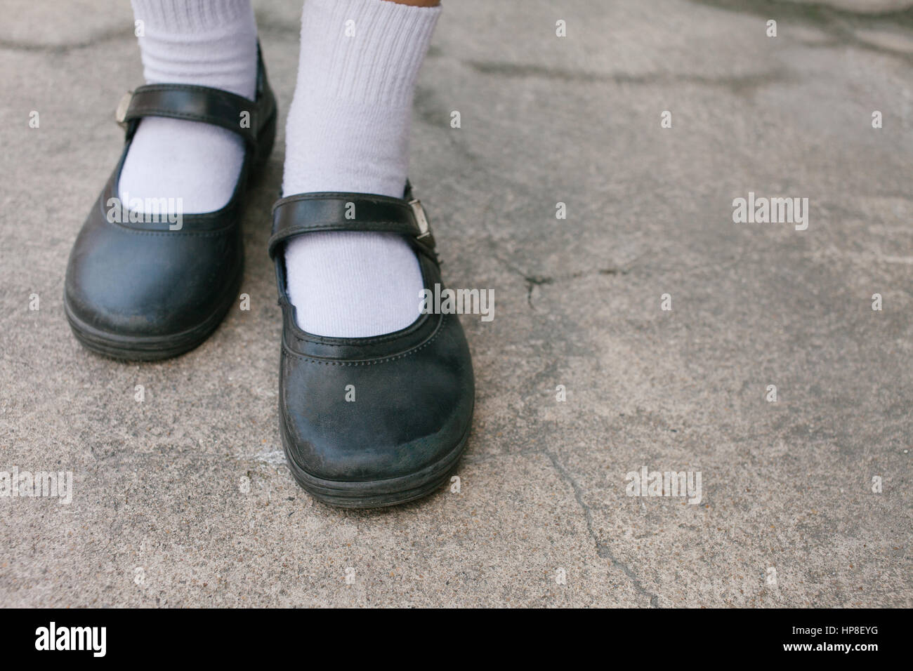 Thai girl Student shoes at concrete background Stock Photo Alamy