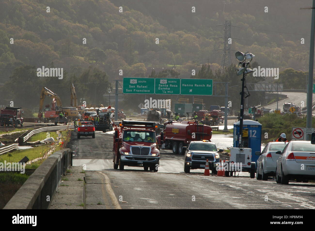 Novato, California, United States. 18th Feb, 2017. Highway CA-37 between San Rafael and Vallejo undergoing significant construction to clear and repair the flooding from Northern California's recent tremendous storms. CA-37 at CA-101 has been closed for two weeks due to flooding. Credit: Peter Graham/Alamy Live News Stock Photo