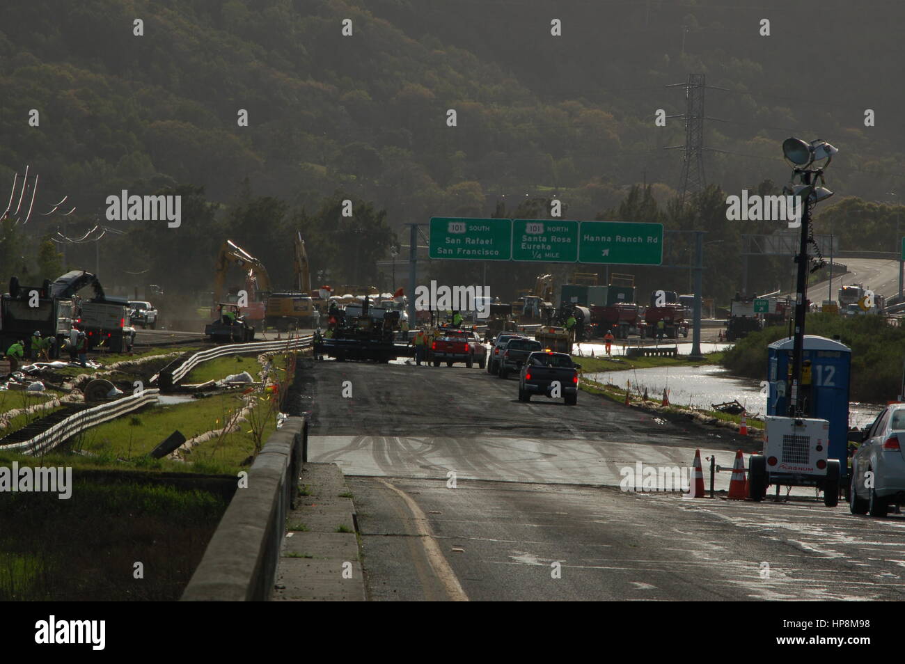 Novato, California, United States. 18th Feb, 2017. Highway CA-37 between San Rafael and Vallejo undergoing significant construction to clear and repair the flooding from Northern California's recent tremendous storms. CA-37 at CA-101 has been closed for two weeks due to flooding. Credit: Peter Graham/Alamy Live News Stock Photo