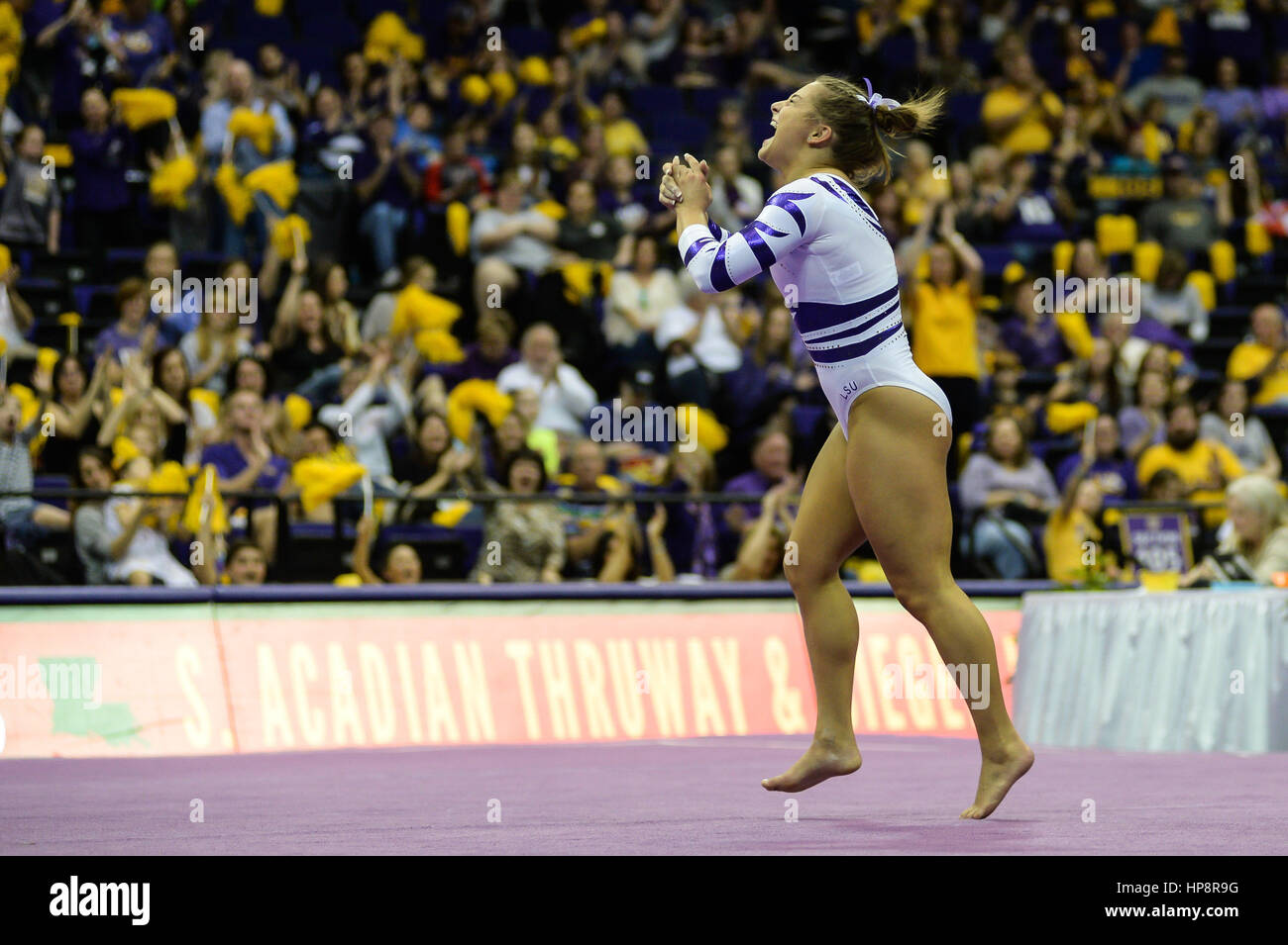 Baton Rouge, Louisiana, USA. 19th Feb, 2017. Mary Lou Retton's daughter MCKENNA KELLEY celebrates after completing her floor exercise routine at the Pete Maravich Assembly Center, Baton Rouge, Louisiana. Credit: Amy Sanderson/ZUMA Wire/Alamy Live News Stock Photo