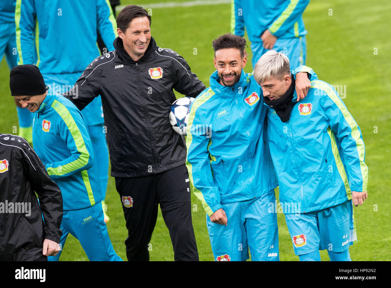 Leverkusen, Germany. 20th Feb, 2017. Javier Hernandez (L-R), headcoach Roger Schmidt, Karim Bellarabi and Kevin Kampl laugh during a final training session before the Champions League round of sixteen match on the 21 of February against Atletico Madrid at the BayArena in Leverkusen, Germany, 20 February 2017. Photo: Marius Becker/dpa/Alamy Live News Stock Photo