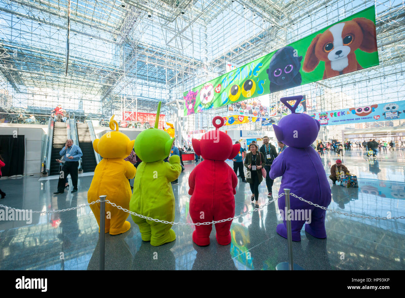 New York, USA. 19th Feb, 2017. Actors dressed as Teletubbies greet visitors at the 114th North American International Toy Fair in the Jacob Javits Convention center in New York on Sunday, February 19, 2017. The four day trade show with over 1000 exhibitors connects buyers and sellers and draws tens of thousands of attendees. The toy industry generates over $26 billion in the U.S. alone and Toy Fair is the largest toy trade show in the Western Hemisphere. ( © Richard B. Levine) Credit: Richard Levine/Alamy Live News Stock Photo