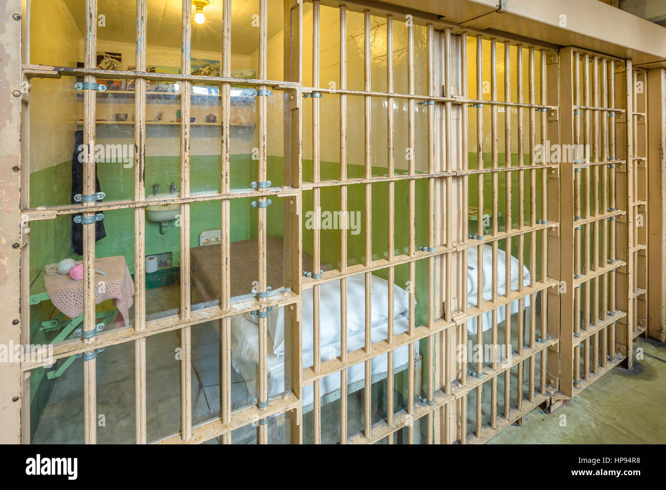 San Francisco, California, United States - August 14, 2016: Alcatraz prison main room with three rows of cells on three levels. Many tourists visiting Stock Photo