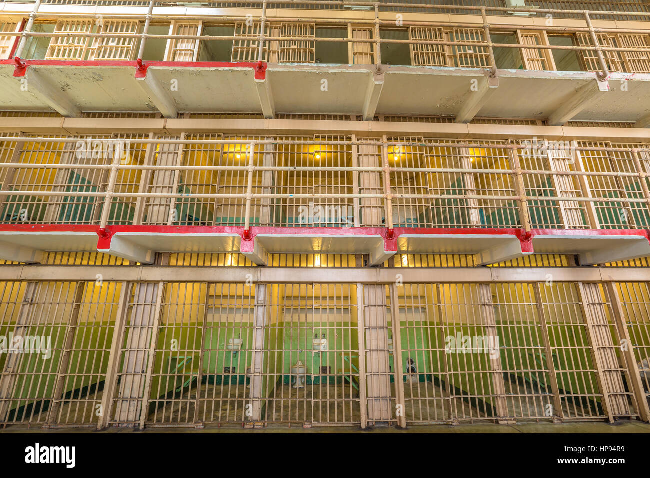 San Francisco, California, United States - August 14, 2016: interior of Alcatraz main room upper cells on three levels. All the cells are single for t Stock Photo