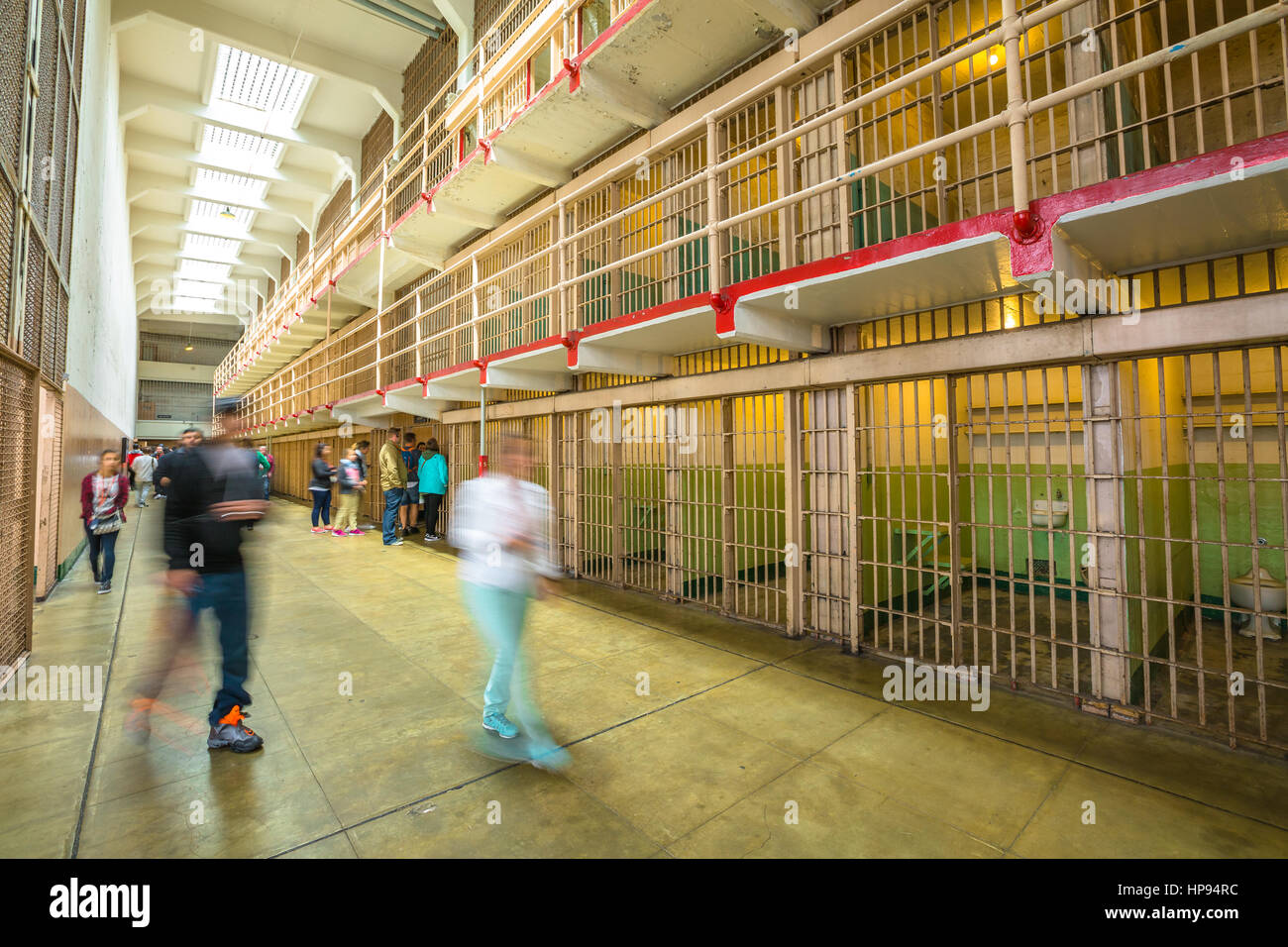 San Francisco, California, United States - August 14, 2016: main room with three rows of cell blocks on three levels. Wiew with people on tour. Popula Stock Photo