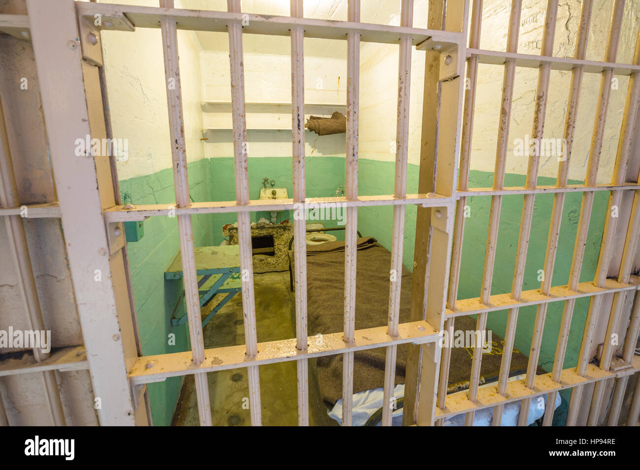 San Francisco, California, United States - August 14, 2016: detail of bars of a single cell of Alcatraz prison from outside view. Popular attraction i Stock Photo