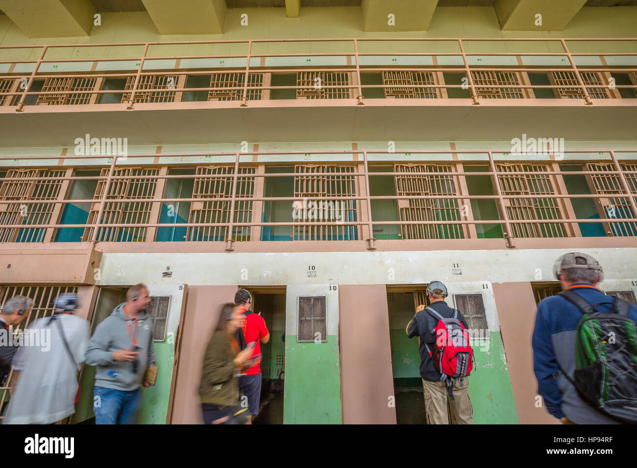 San Francisco, California, United States - August 14, 2016: Alcatraz isolation cells on ground level. All cells are single with armoured door and stee Stock Photo