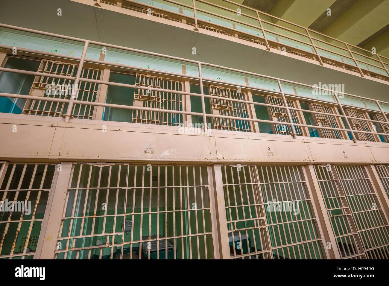 San Francisco, California, United States - August 14, 2016: interior of Alcatraz three level cells. People visiting prison in touristic tour every day Stock Photo
