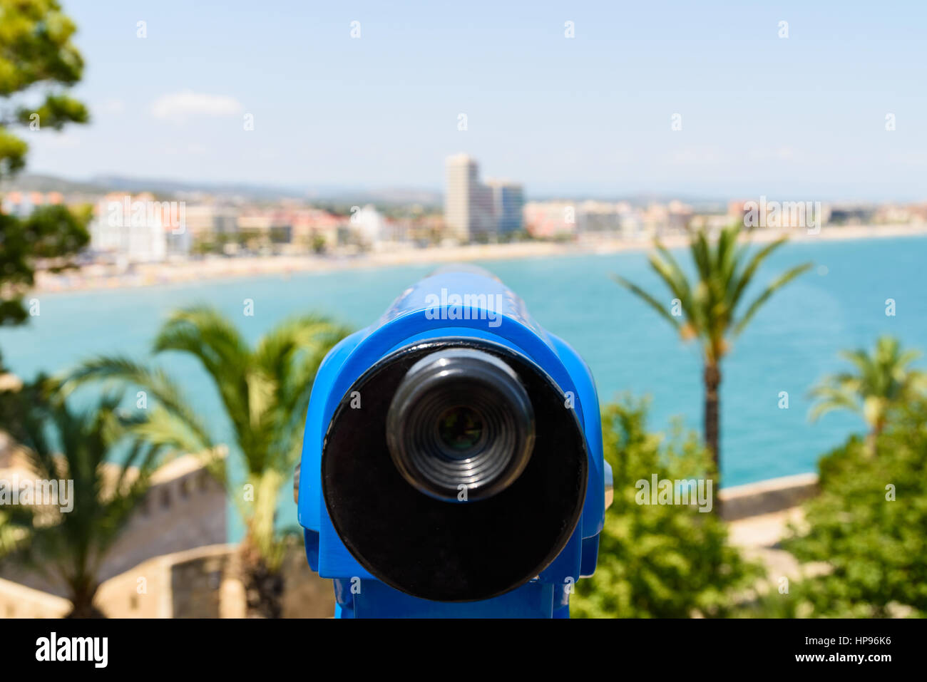 Blue Coin Operated Telescope Of Panoramic Tropical City And Ocean View Stock Photo