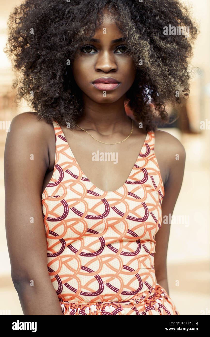 Portrait Of Beautiful Girl With Dark Skin And Curly Hair Stock Photo Alamy