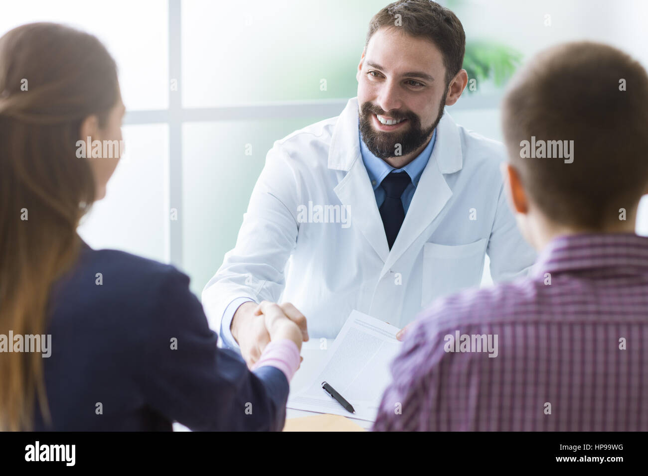 Doctor meeting couple hi-res stock photography and images - Alamy