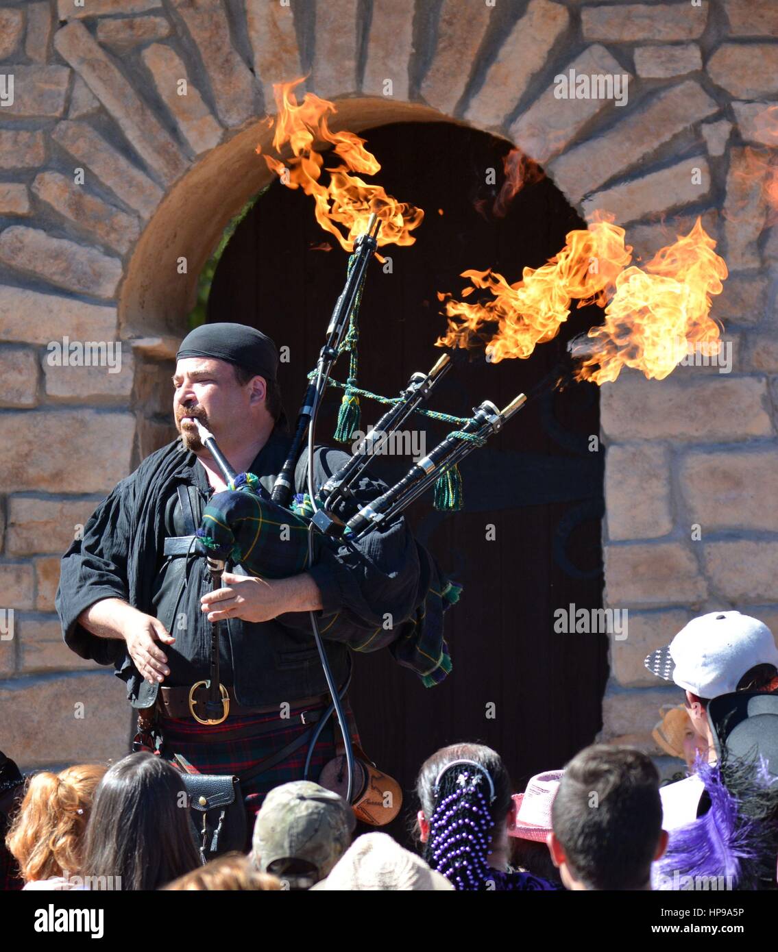 Bagpipe Player with Flames Stock Photo