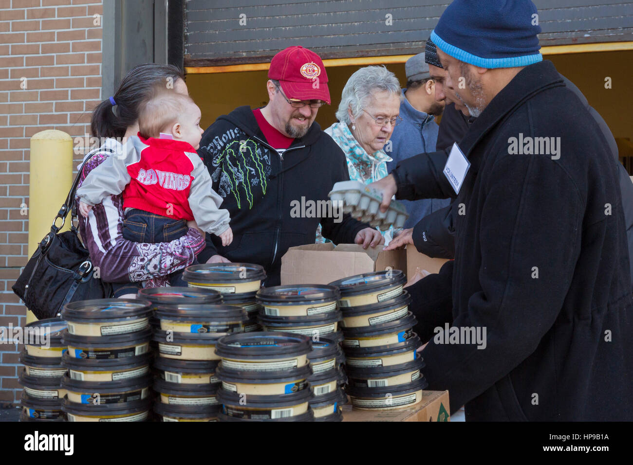Flint, Michigan - The Muslim Food Pantry. Twice a month, members of Flint's Muslim community distribute free food to anyone who needs it. Stock Photo