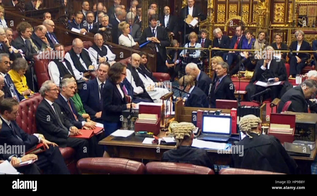 Prime Minister Theresa May sits behind the speaker (far right) as Baroness Williams of Trafford speaks in the House of Lords, London, during a debate on the Brexit Bill. Stock Photo