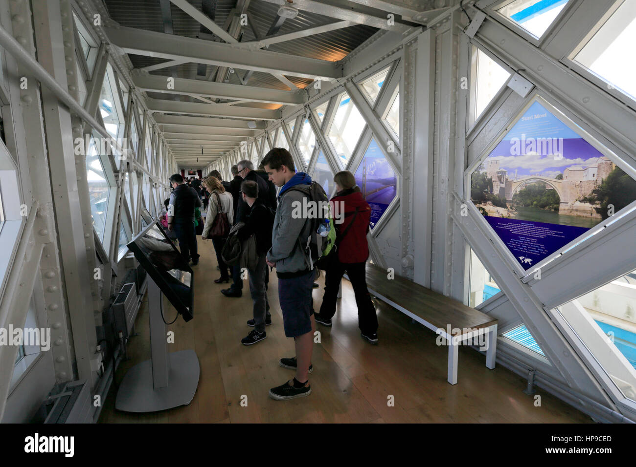 Tourists in the Tower Bridge Glass Floor walkway, River Thames, London City, England, UK Stock Photo