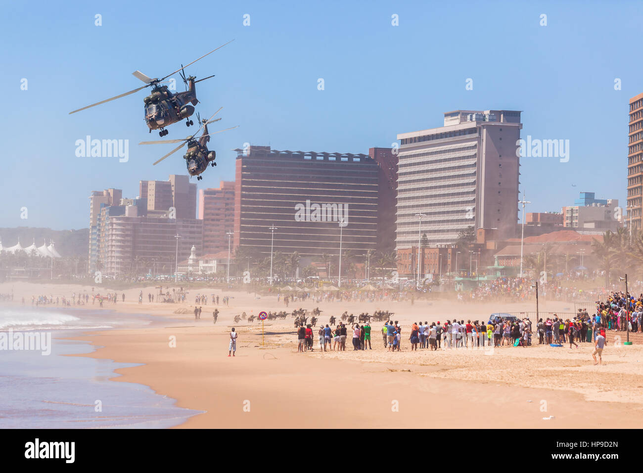 Helicopters military aircraft airlift dropping soldiers on Durban beach