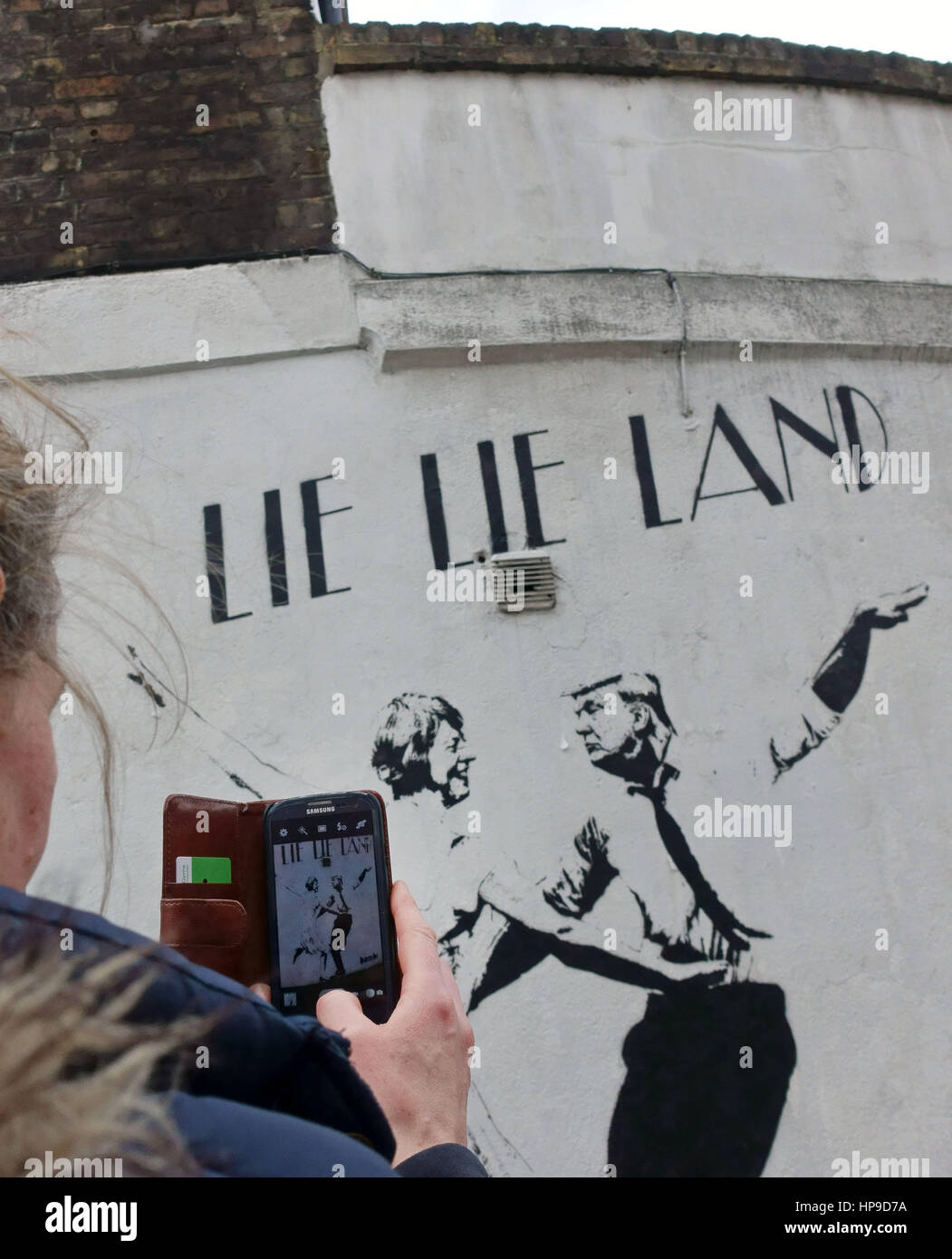 'Lie Lie Land' by street artist Bambi spoofs the Hollywood movie with May and Trump as the dancers, Islington, London Stock Photo