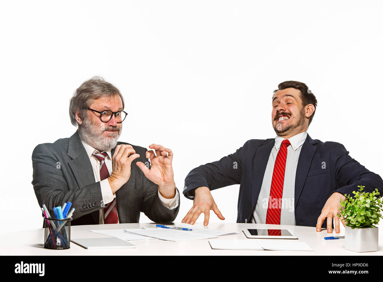 Two Team Members The two colleagues working together at office on white background Stock ...