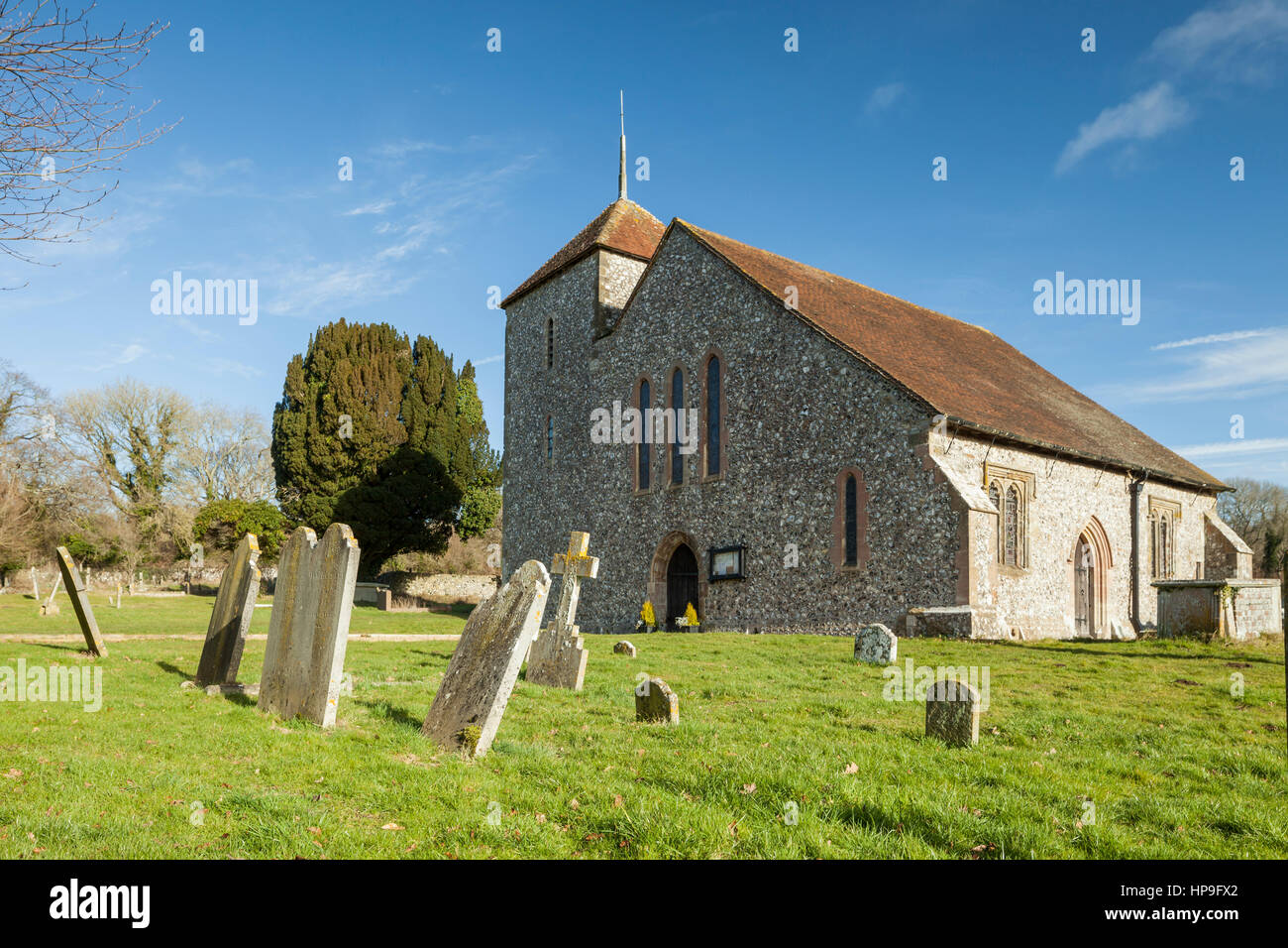 Sunny winter day at St Mary's church in Clapham village, West Sussex